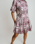 Woman wearing a Laroque Hannah Dress in Wrangler patter against a plain background