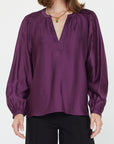 Purple long sleeve silky blouse with a v-neck collar