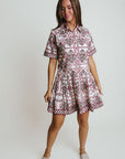 Woman wearing a Laroque Hannah Dress in Wrangler patter against a plain background