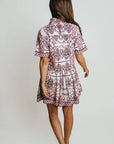 Woman wearing a Laroque Hannah Dress in Wrangler patter against a plain background