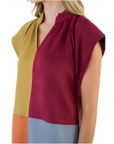 Colorblocked 4 panel suede dress in blue Maroon orange and chartreuse
