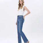 High rise stretch slim bootcut jeans in medium dark wash, fabric and stitching detail