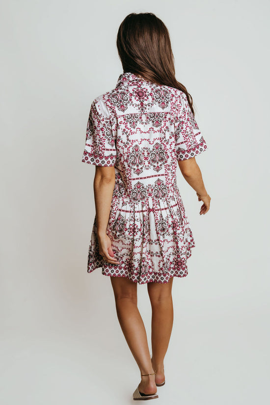 Woman wearing a Laroque Hannah Dress in Wrangler patter against a plain background