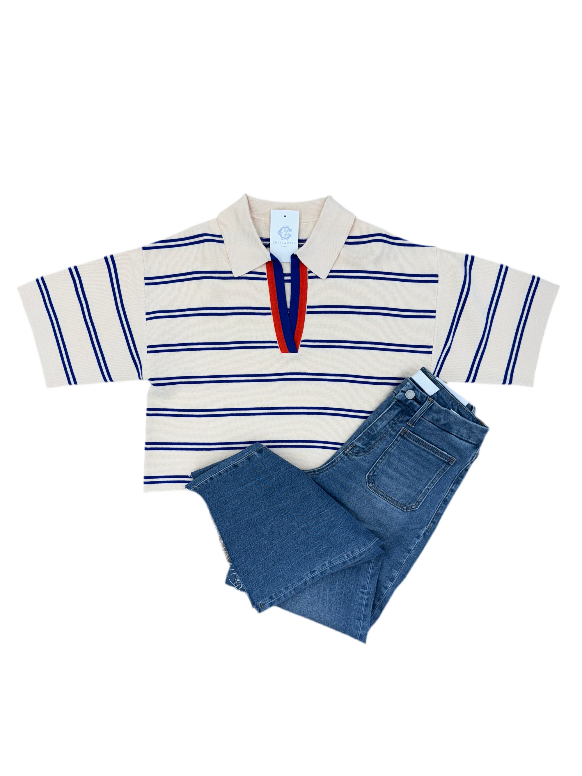 Striped polo shirt with a orane abd blue stripe v- neck collar and blue jeans on a white background