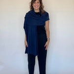 100% cashmere wrap in navy worn as a shawl - Chatsworth Boutique