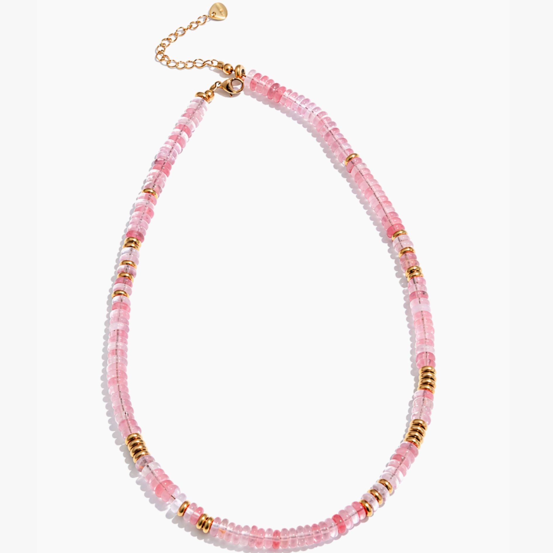 Necklace with pink beads and gold accents on a white background