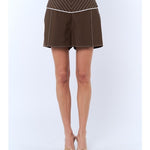 Brown shorts with white stitching on a white background