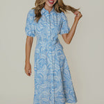 A blue and white collared midi shirtdress with a belt.