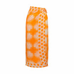a yellow gold dot sarong with palm frond design.