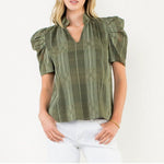 A mesh check print olive green blouse that is v-neck and has puff sleeves.