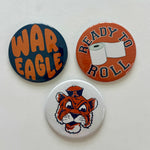 Auburn game day pin-back button set featuring War Eagle, Ready to Roll, and Tiger Mascot designs, from Chatsworth Boutique in Fairhope, Alabama.