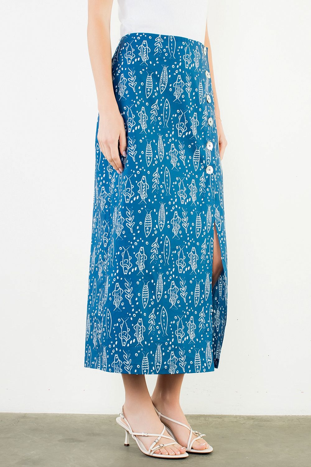 Another front view of the Button Detail Fish Skirt by THML, highlighting the blue and white fish print, from Chatsworth Boutique.