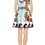 Back view of the Chocolate/Teal Mini Dress by Ciebon, showing the belted waist and wave-pattern hem detail, from Chatsworth Boutique.