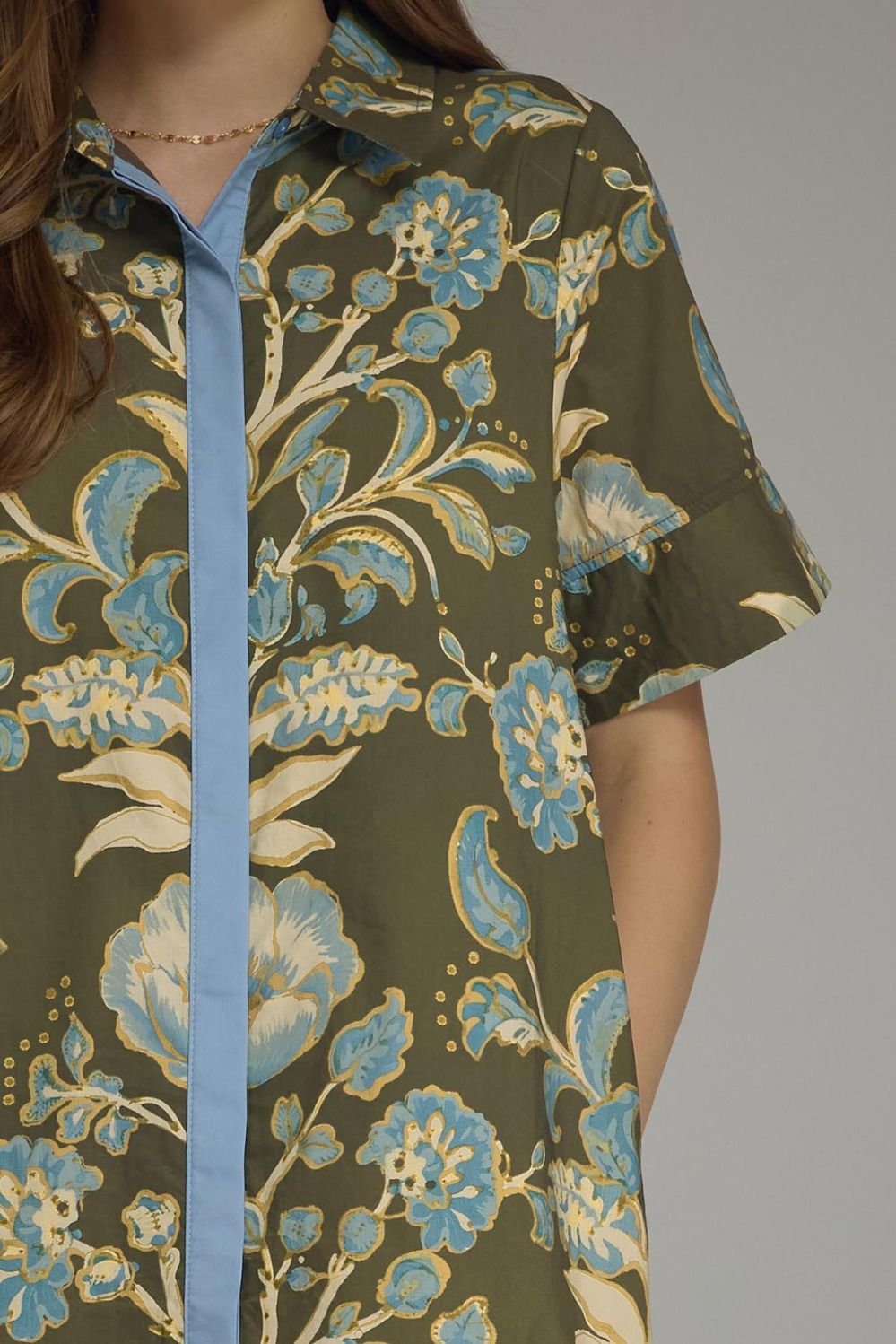 Another front view of the Contrast Trim Shirtdress Midi by Entro, highlighting the lightweight olive floral fabric and midi length, from Chatsworth Boutique.