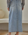 Lt blue denim skirt back pockets and frayed hem