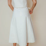 LaRoque Haven Skirt in Ivory, front view, belted waist and gold button detail