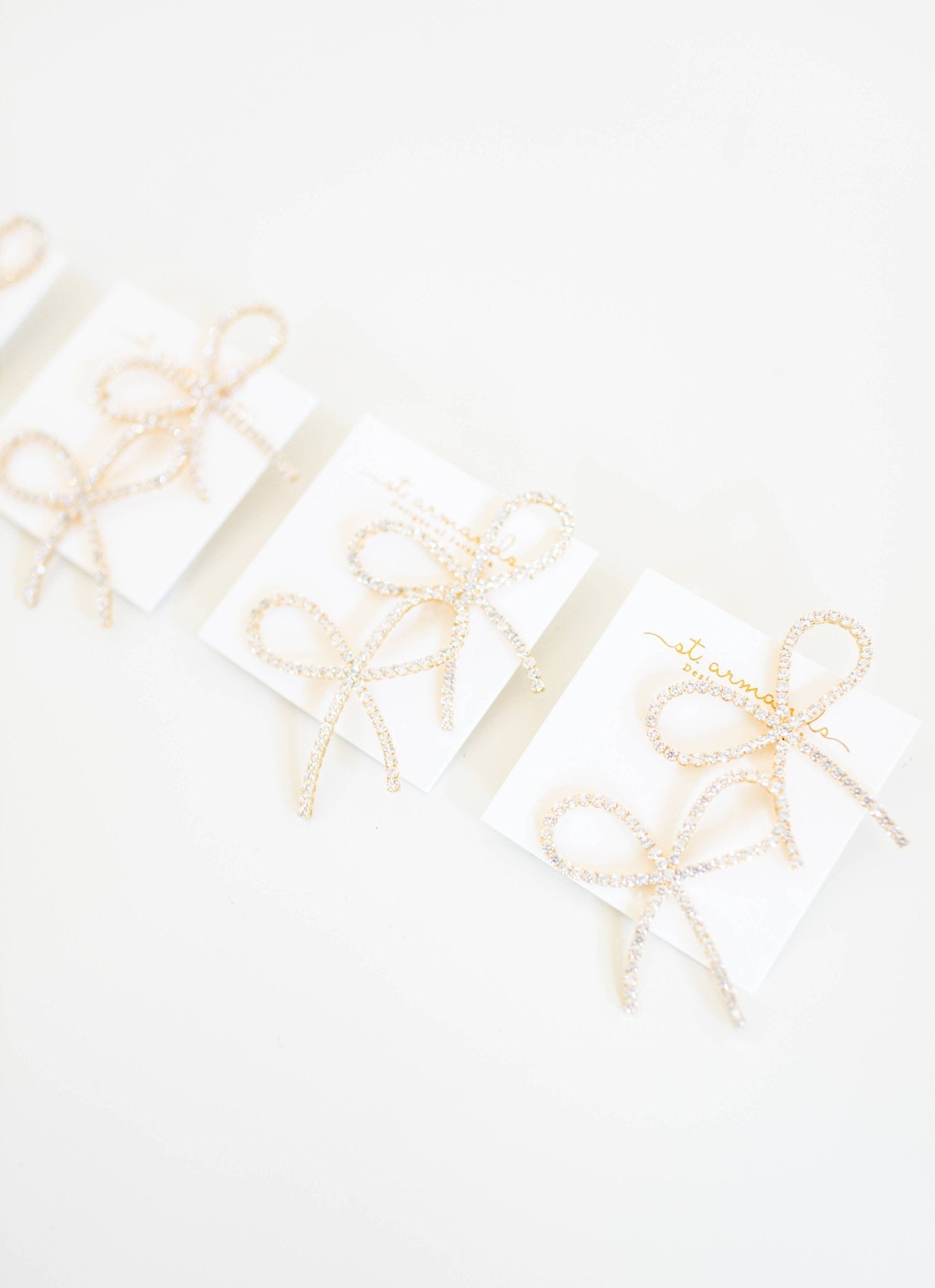 Rhinestone Statement Bow Holiday Earrings - Chatsworth Boutique