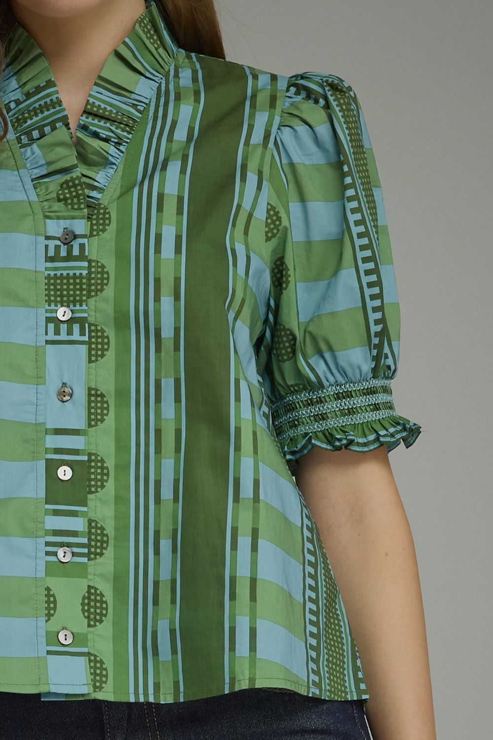 Back view of the Stripes and Dots Blouse in green by Entro, from Chatsworth Boutique in Fairhope, Alabama.