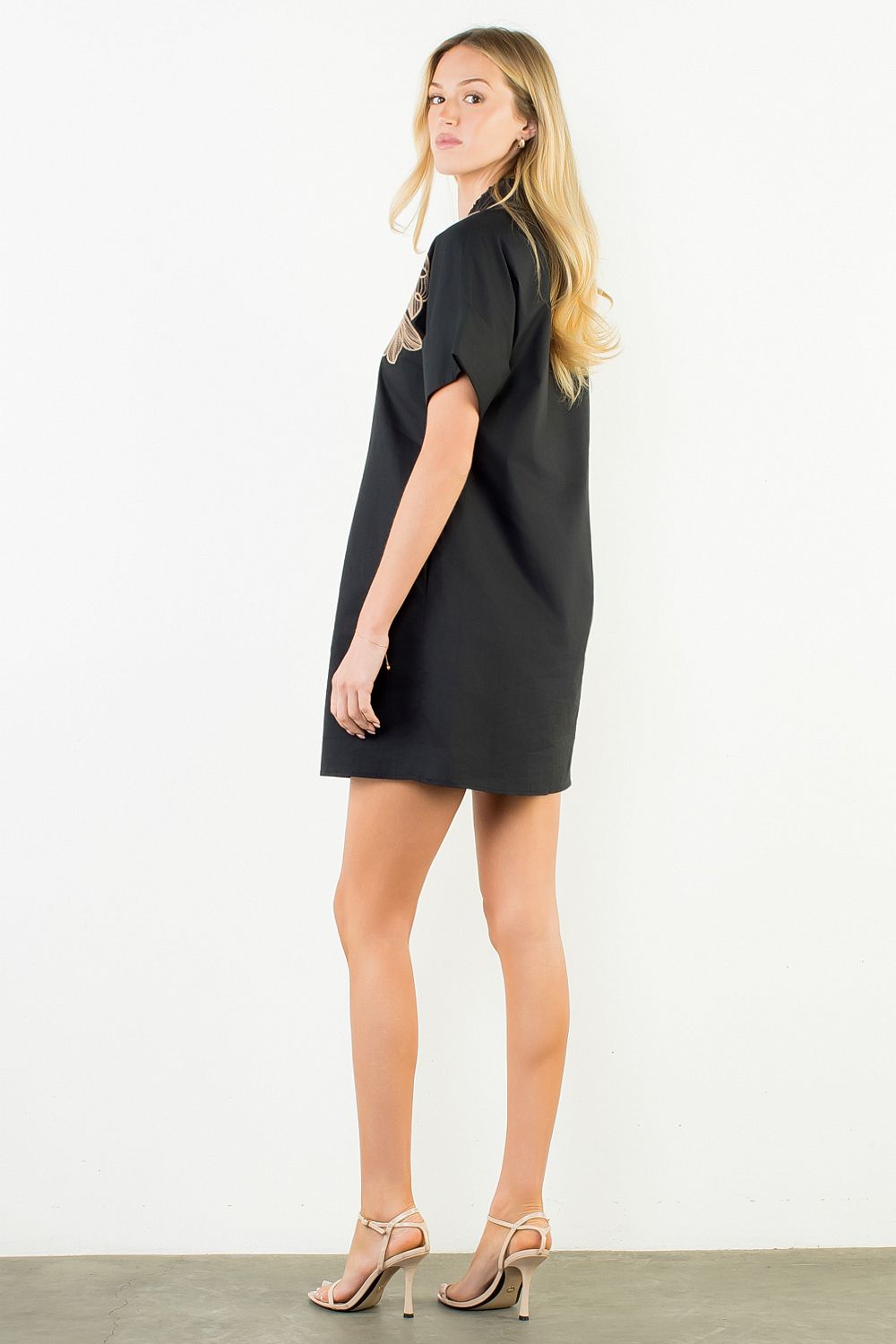 Black embroidered floral mini dress, back view