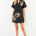 Black embroidered floral mini dress, front view